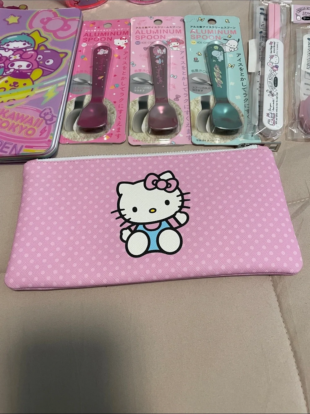 Sanrio Bundle: includes cups, utensils, notebook and zippered pouch.